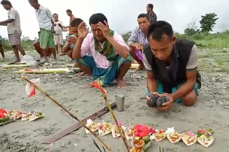 Chirang people pray to save from flood and erosion