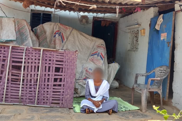 wife protest in front of husband's house in suryapet district