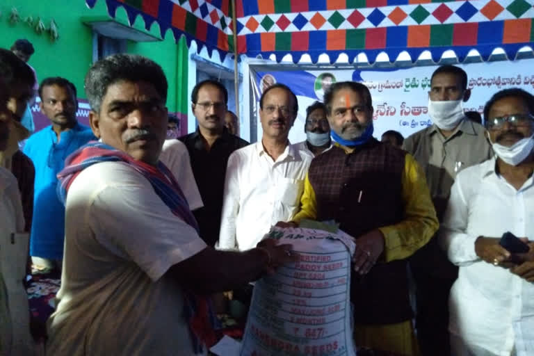 speaker thamineni sitharam distributes seeds to farmers in srikakulam dst purushothama puram rythu bharosa centers