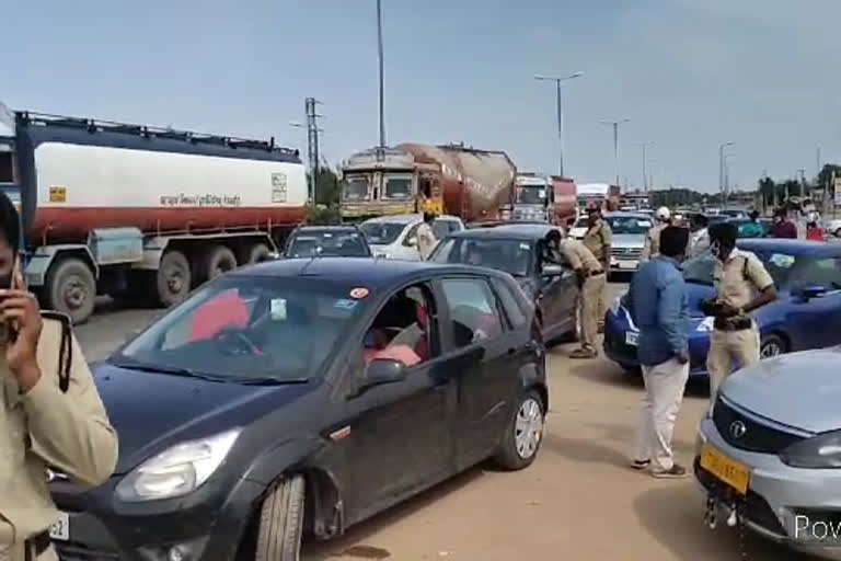 huge vehicles at garikapadu checkpost