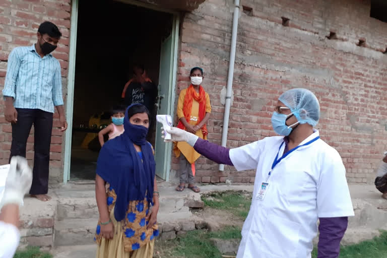 door-to-door screening is being done regarding corona epidemic in sheikhpura