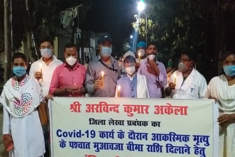 NRHM took out candle march