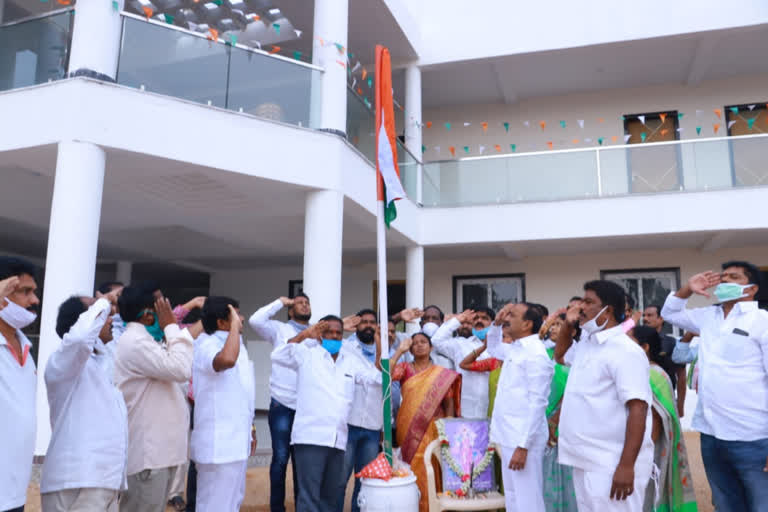 minister etala rajender hoisted national flag on the eve of telangana formation day