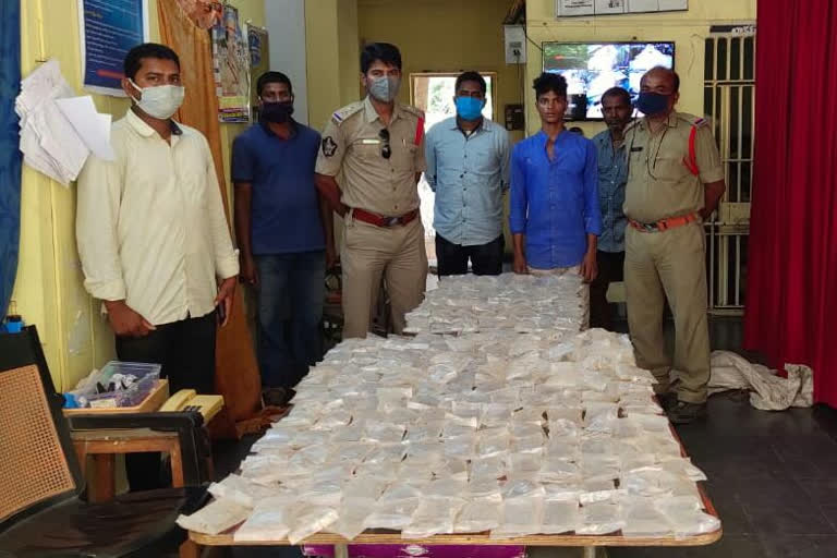 cheap liquor packets caught by police in visakha district