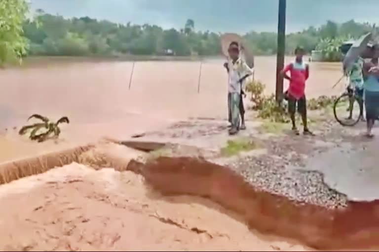 Rain water washed out pwd road at karimganj assam etv bharat news