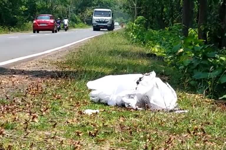 PPE kit on the side of the road in front of Covid Hospital