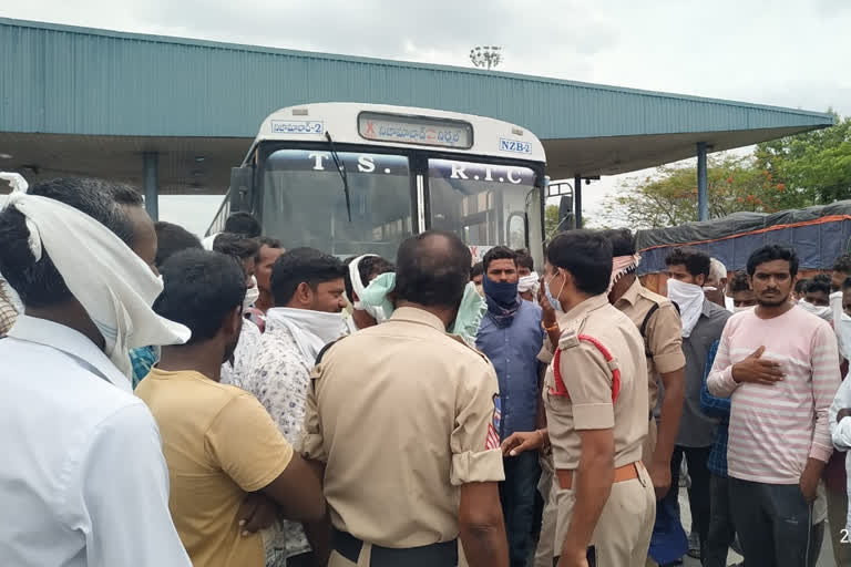 nirmal district farmers protest demanding lorries