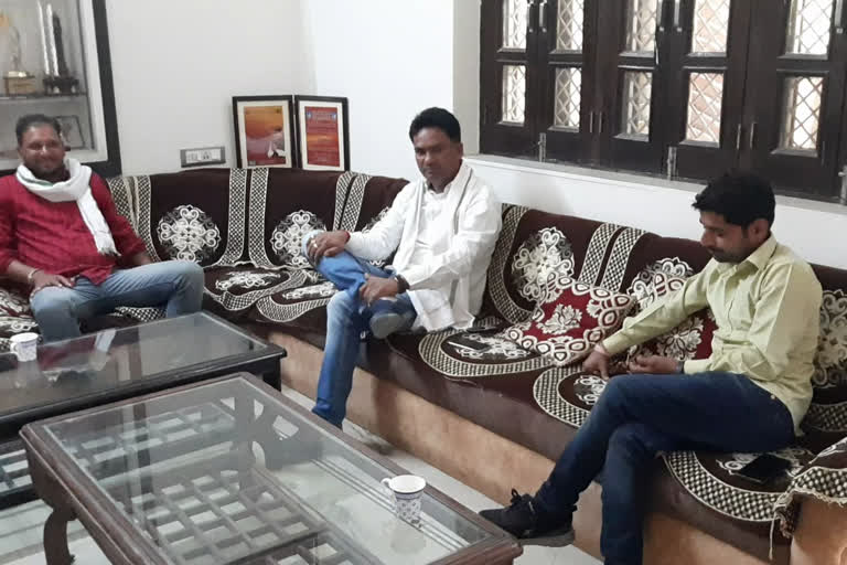 BJP MLA Chandrabhan Singh Aakya (in white shirt) at his home