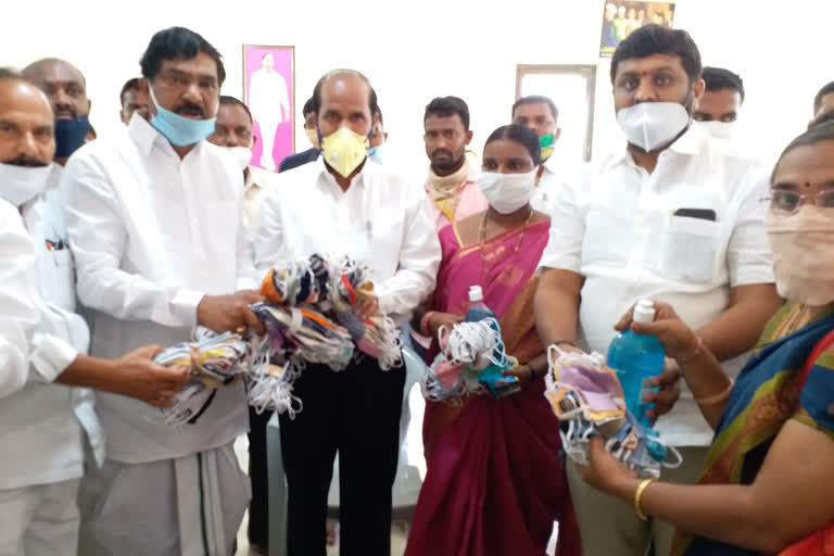 mla rajaiah distributed masks and sanitizers to 10th class students