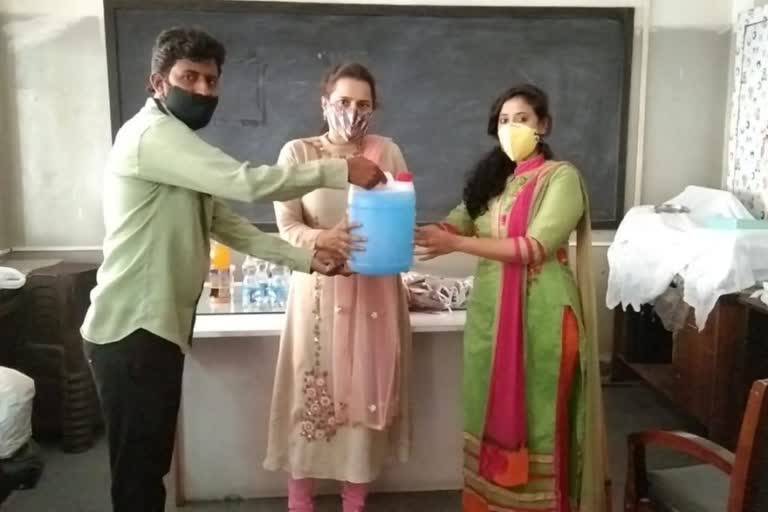 masks and sanitaizers distribution to students in hyderabad