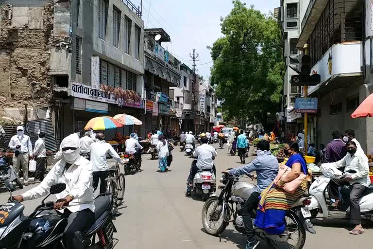 markets start and shops get open in Dhule city