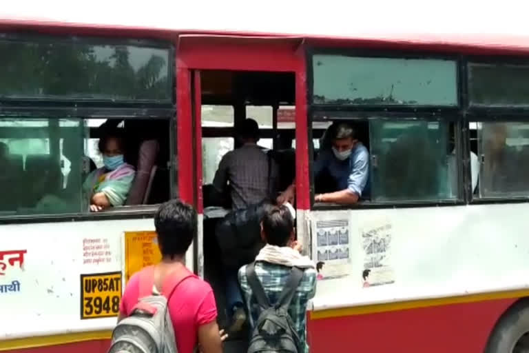 Passengers getting sanitized before sitting in but at greater noida