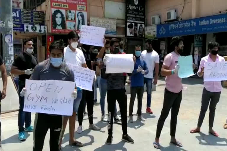 gym trainers protest against government in greater noida