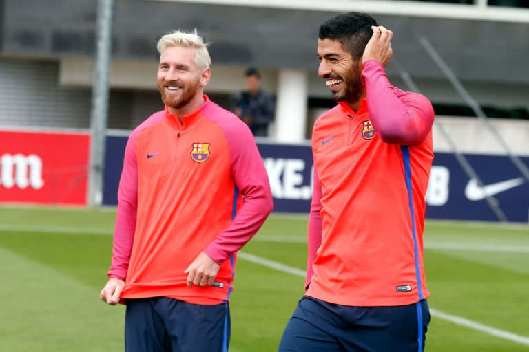 Lionel Messi and Luis Suarez