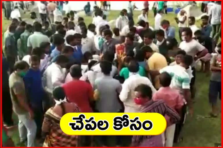 huge-people-gathered-at-a-pond-for-fish-in-yadadri-district