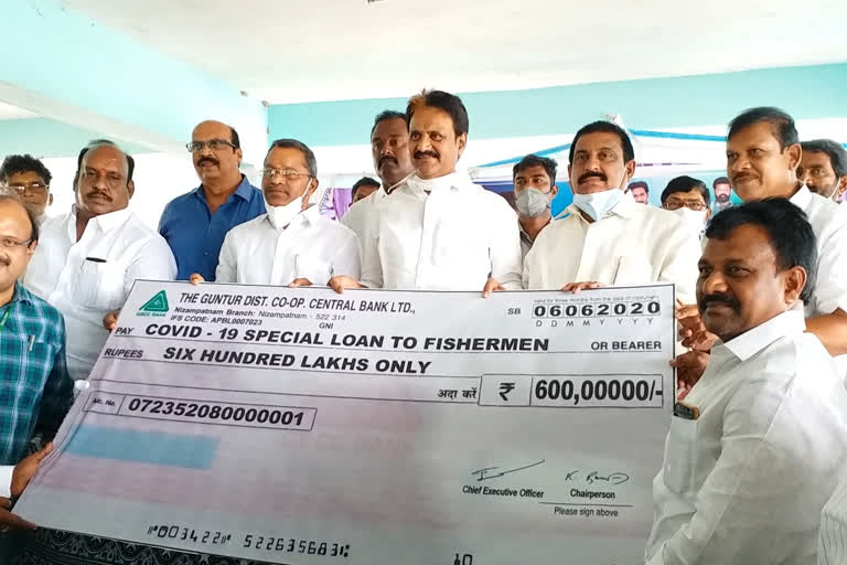 miniser mopidevi venkataramana given loan cheque to fishermen in guntur district