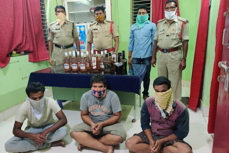 three members arrested in liquor case