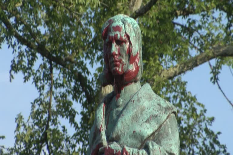 protesters topple statue of Columbus