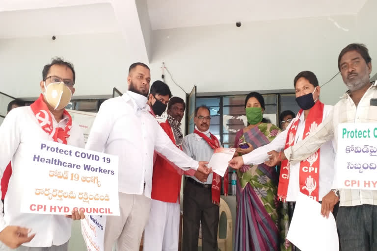 hyderabad district cpi leaders protest at bandlaguda mro office