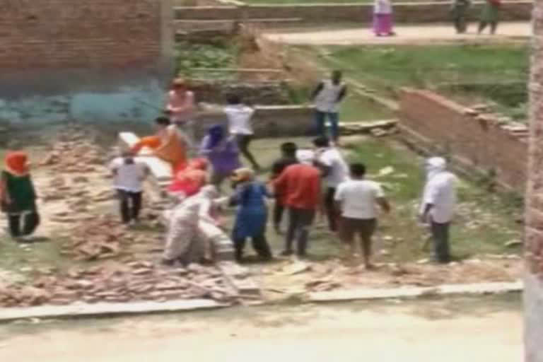 clash between two groups over land dispute in palwal