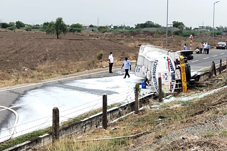 petrol tanker rolled down near guntur outskirts and two people injured