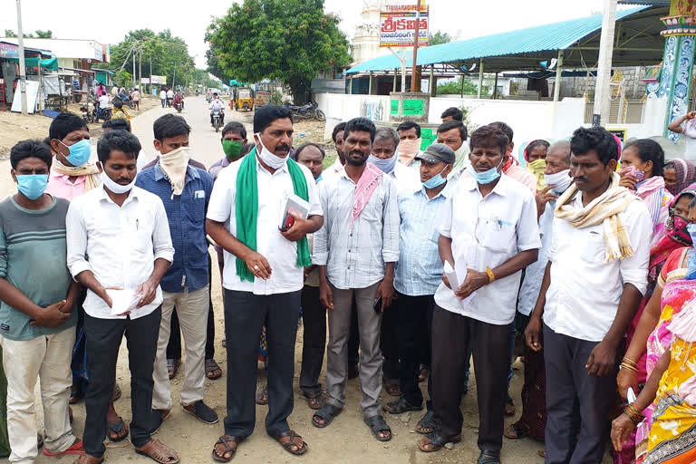 Tribals protest at thimmaraopet in khammam district