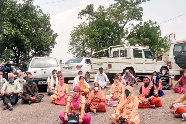 People go to the police station to protest against the controversy in Bilaspur