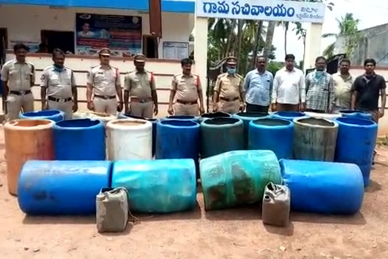 excise police raids in local liquor centers at jaggampeta