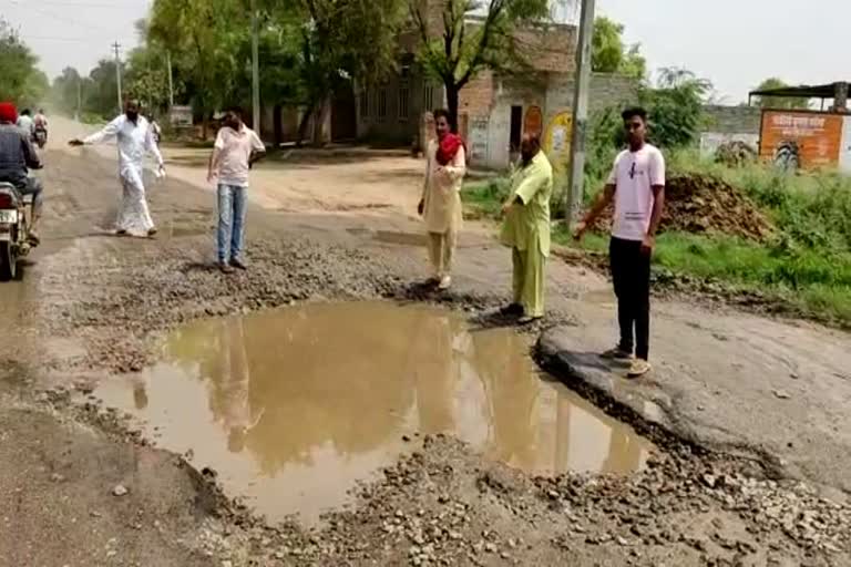 Big pits on the road in Bithmada village hisar