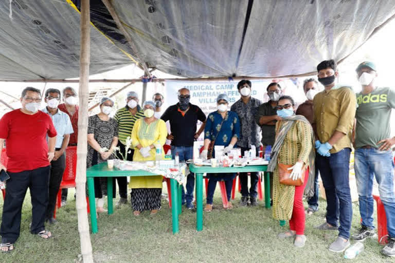 doctor-filmmaker kamleshwar mukherjee goes back to treating patients affected by amphan after ages