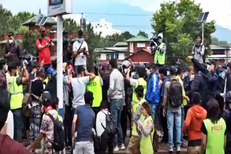 protest in nepal against oli govt response over covid control