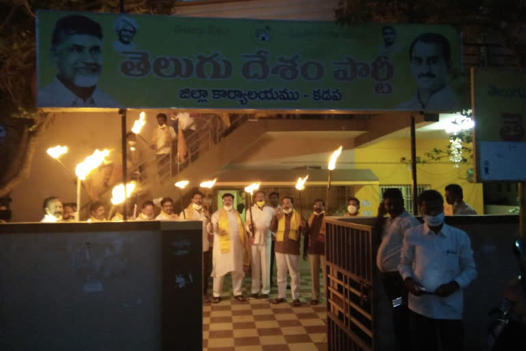 kadapa tdp protest with fire sticks against government arrests tdp leaders