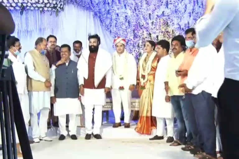 Karnataka Minister bins Covid norms at MLA's son's wedding