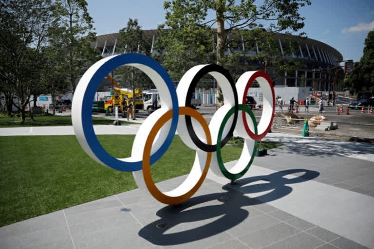 tokyo olympic board member support another delay if needed