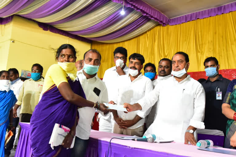 minister indrakaran reddy cheques distribution in nirmal district