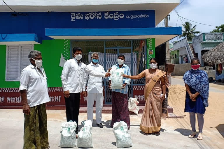 Distribution of seeds at raithu bharosa centers at chirala in prakasam district