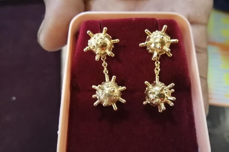 corona earrings made by jewelry shop owner in pudhukottai