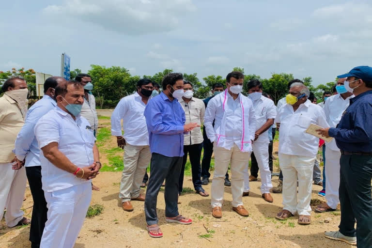 mlc raju and mla kp vivekanand examining haritaharam arrangements at Dundigal medchal district