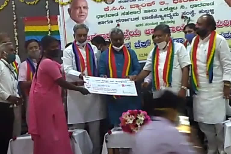 Minister ST Somashekhar issued check for Asha activists