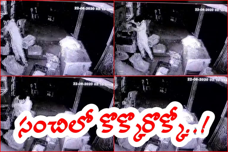 a-man-who-is-stealing-chickens-in-a-roadside-hotel-at-kanchili-in-srikakulam-district andhra pradesh