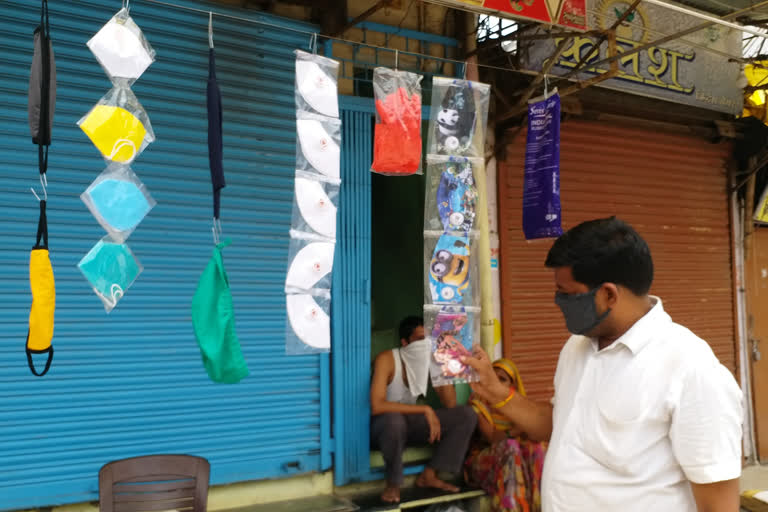 Cartoon printed masks for children in the market in burhanpur