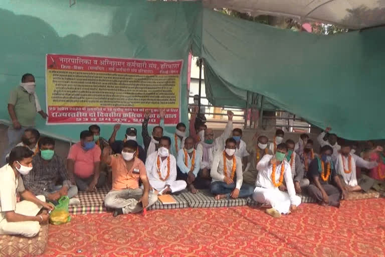 Employees sitting on a two-day hunger strike in hisar