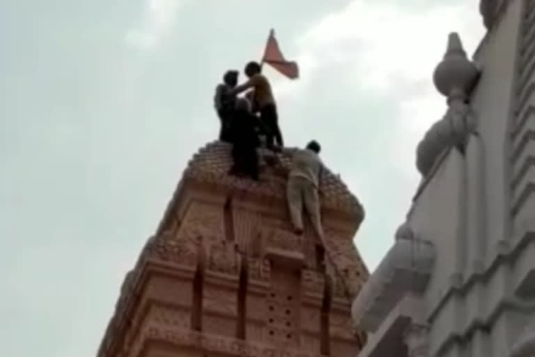 youth climbed top of mayapur sikri temple brought down safely in ghaziabad