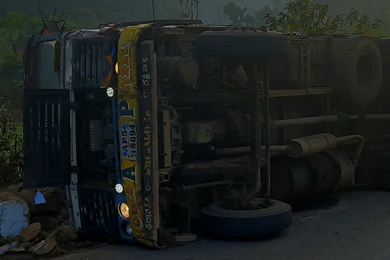 lorry rolled down in paderu agency ghat road