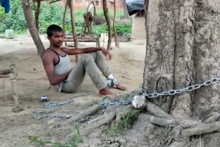 father tied his son with chains for food in kaushambi