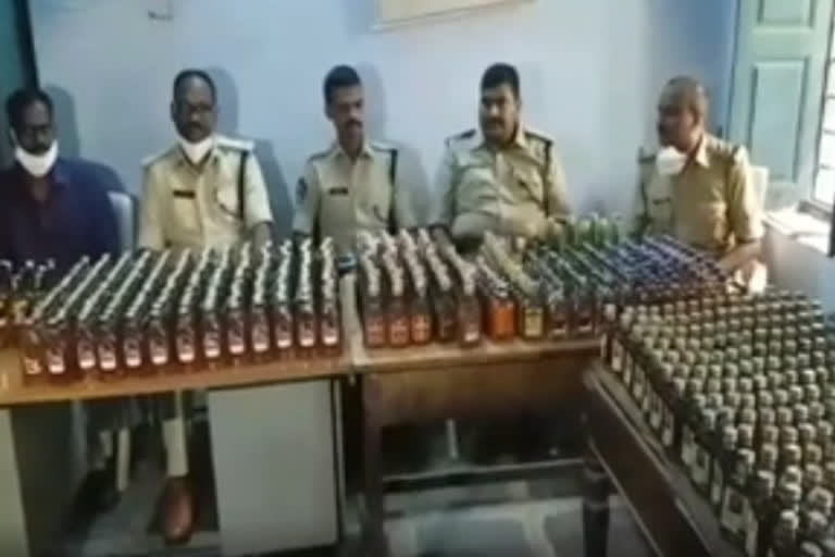 illegal liquor bottles seized in kadapa dst