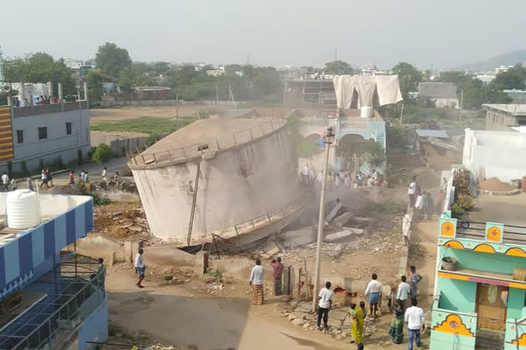 water tank has been crashed with the help of jcb in badwel at kadapa district