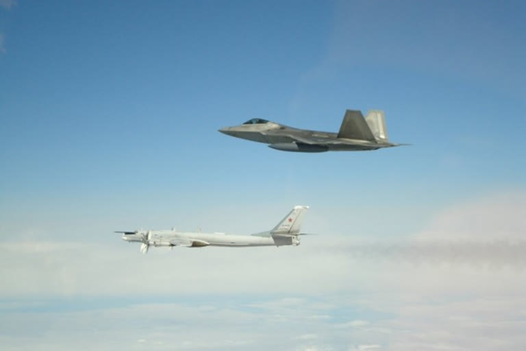 us f 22 jets intercept russian jet