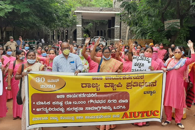 Asha workers protest over  various  demands in Bellary