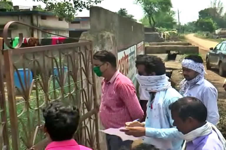 Administrative staff outside the Quarantine Center